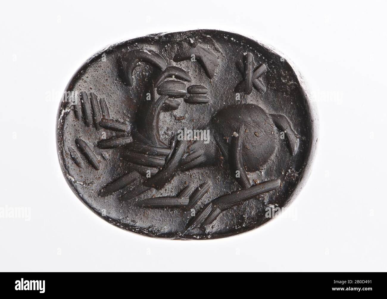 Nach rechts liegender RAM, nach links gedrehter Kopf, mit Stern, Stempel, Hämatit, Farbe:, Form: Daktyloid, Verarbeitung:, Stil: 13 x 16 x 13 mm Stockfoto