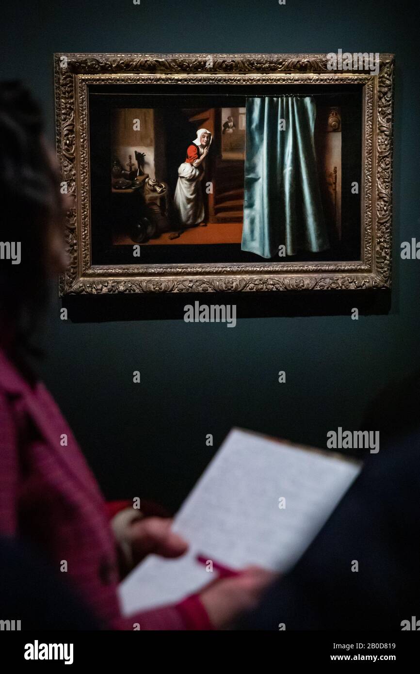 Der Laudasein von Nicolaes Maes wird von Galeriebesuchern in einer Presseansicht für die neue Ausstellung Nicolaes Maes: Dutch Master of the Golden Age, in der National Gallery, London, angesehen. Stockfoto