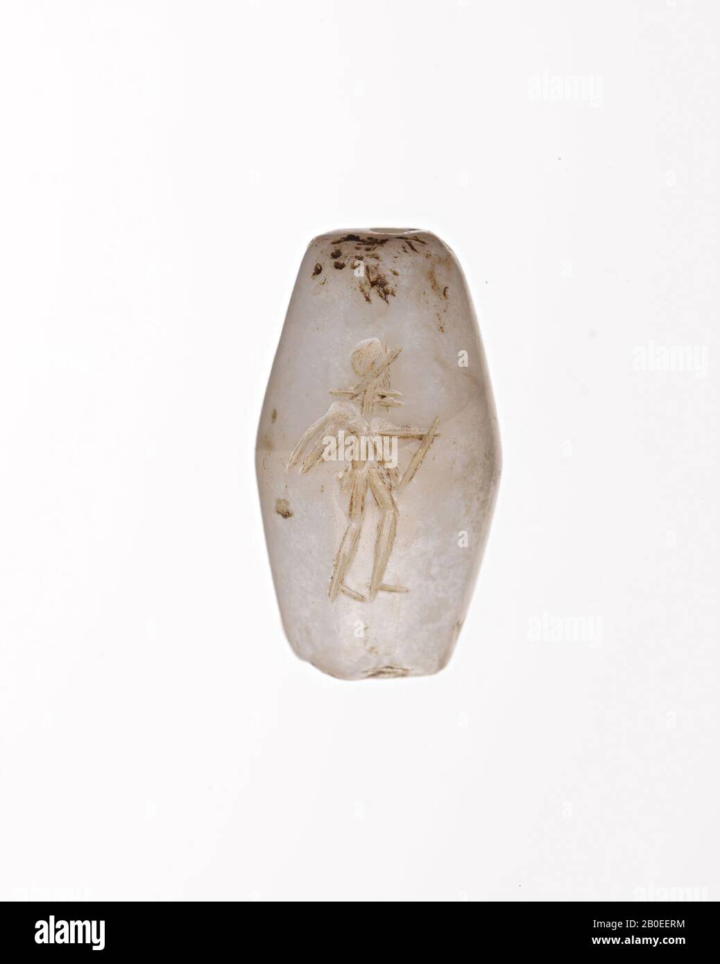 Ein röhrenförmiger Stein mit Rillen, in dem eine Lauffigur verkratzt wurde. Falsch, Dichtung, Stein, weiß, H 2,1 cm, D 1,1 cm, Iran Stockfoto