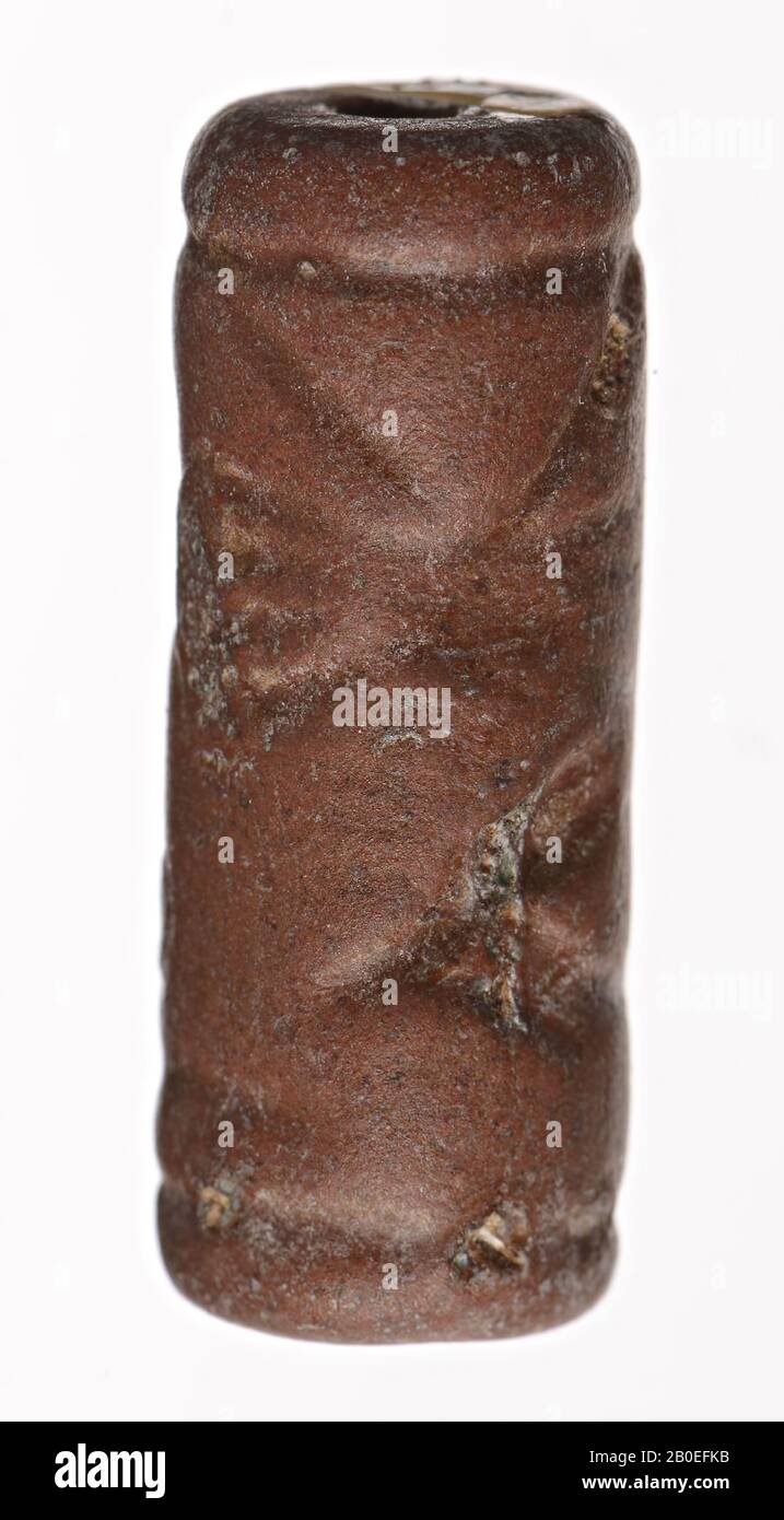 Ein Steinzylinderstempel mit der doppelten schematischen Darstellung von Laufvögel, die sich gegenseitig betrachten., Siegel, Stein, H 2,3 cm, D 0,8 cm, Iran Stockfoto