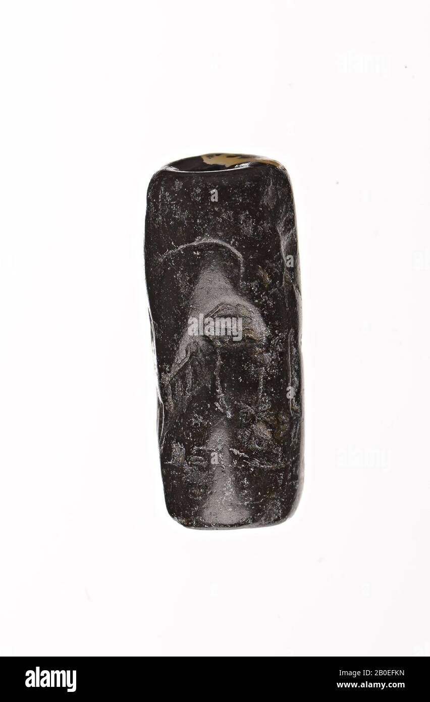Eine Steinzylinderdichtung mit einem unklaren Bild, Siegel, Stein, H 2,3 cm, D 0,9 cm, Iran Stockfoto