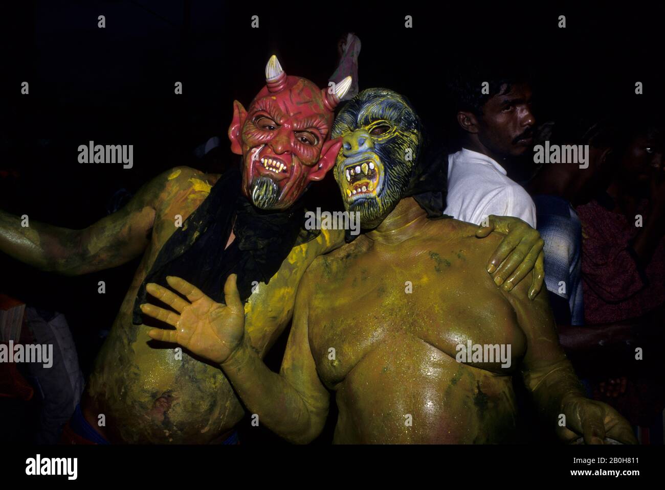 TRINIDAD, HAFEN VON SPANIEN, J'OUVERT, JU VAY CELEBRATION, KARNEVAL OPENING, MENSCHEN MIT MASKEN Stockfoto