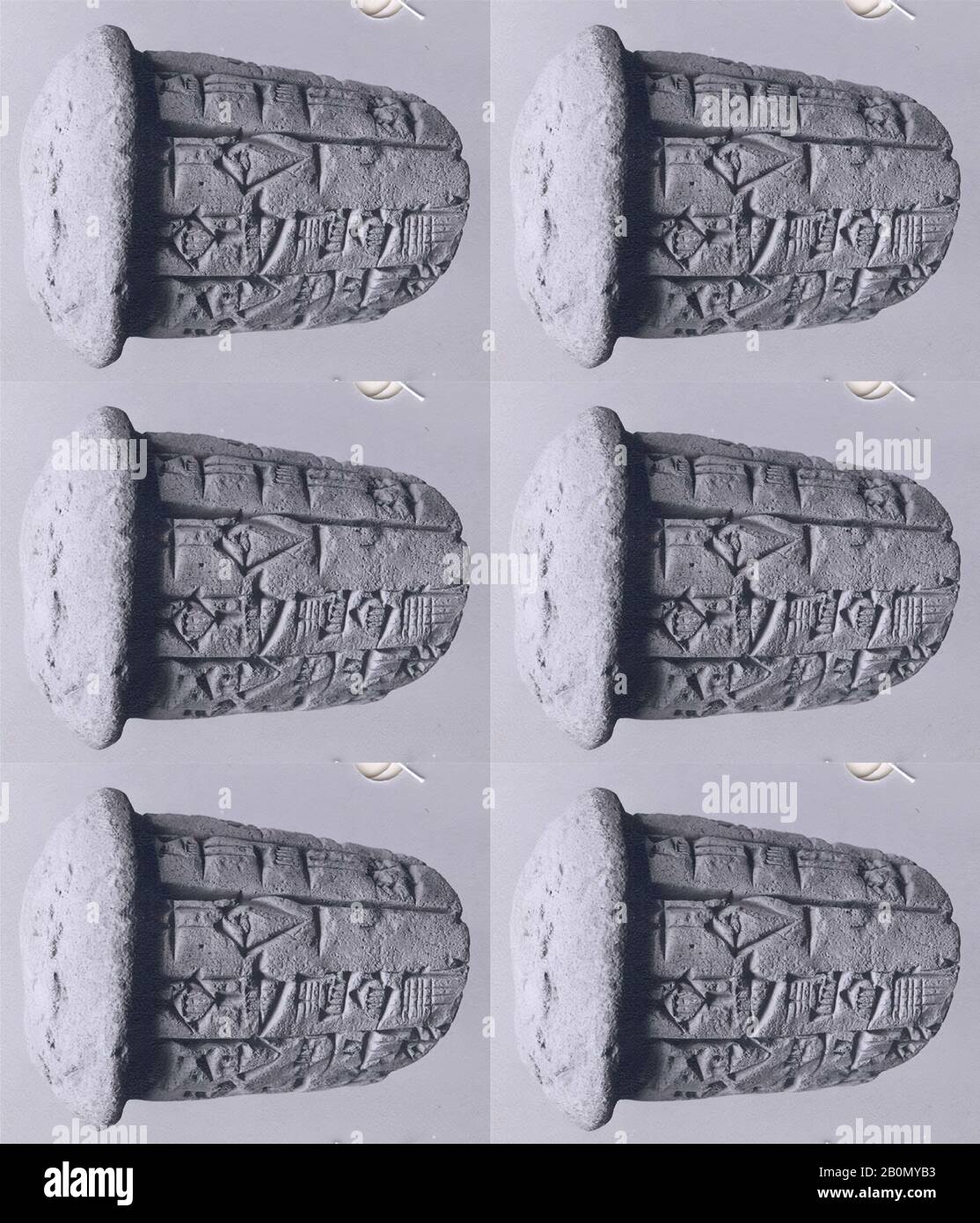 Votivkegel mit Keilschrift von Gudea, Neo-Saumerian, Neo-Saumerian, Date Ca. 2090 v. Chr., Mesopotamien, wahrscheinlich aus Girsu (modernes Tello), Neo-Saumerian, Clay, Kopf: 2 1/8 Zoll (5,4 cm), Oberseite: 5 3/4 Zoll (14,5 cm), Ende: 5 1/8 Zoll (13 cm), Länge: 2 Zoll (5 cm), Gesamt: 2 1/2 Zoll (6,5 cm), mit Clay-Tablets Beschriftet Stockfoto