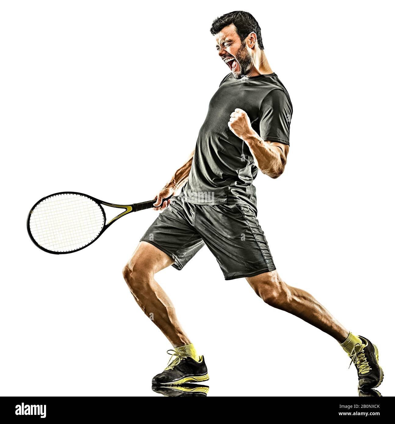 Ein kaukasischer, reifer Tennisprofi glücklicher Gewinner starke, kräftige Silhouette in voller Länge im Studio isoliert auf weißem Hintergrund Stockfoto
