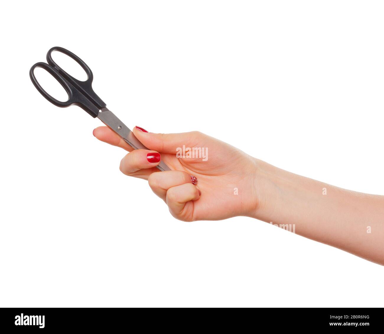 Weibliche hand mit Schere isoliert auf weißem Stockfoto