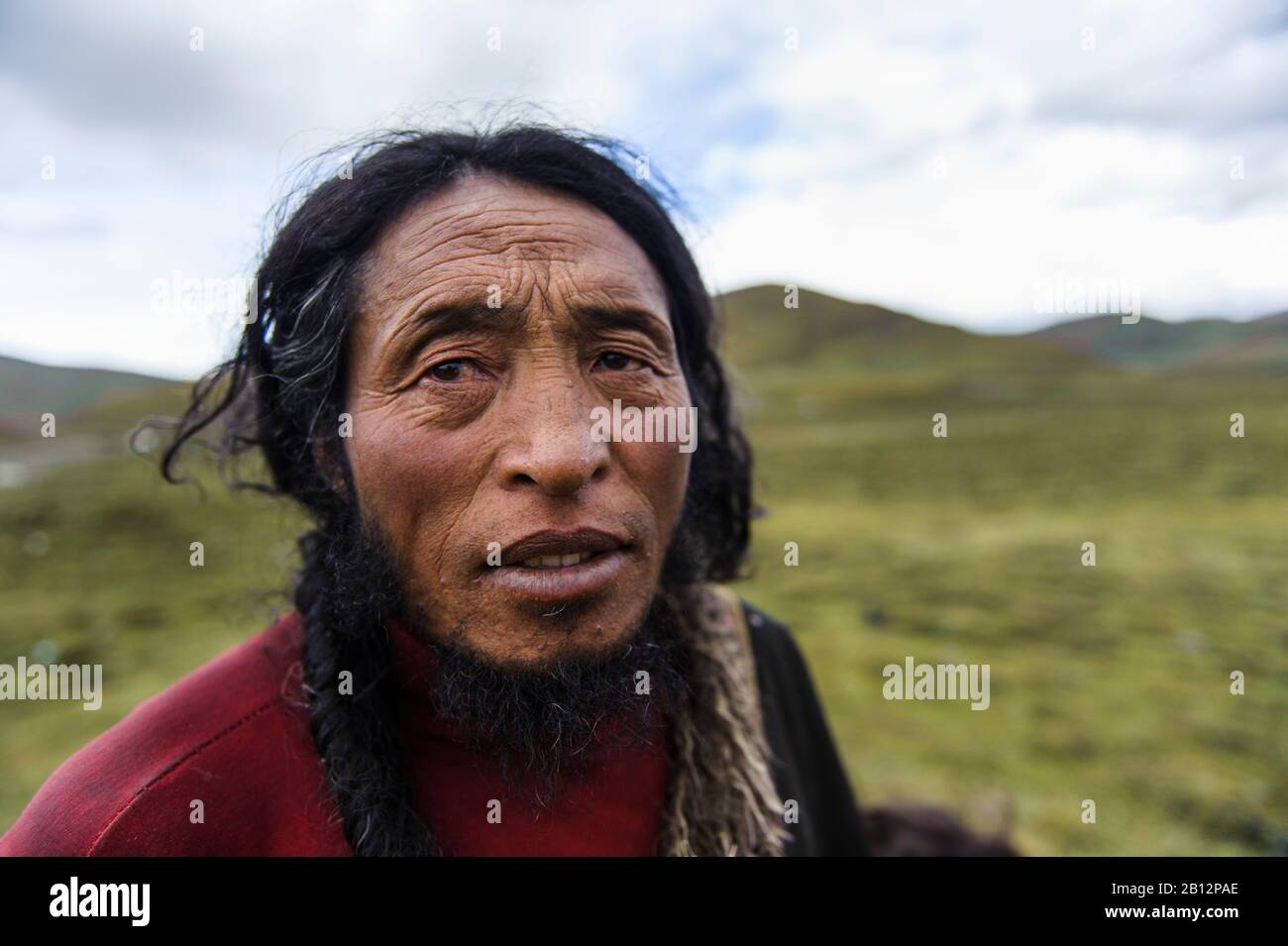 Porträt des tibetischen Mannes, tibetisches Plateau, Kham und Amdo Stockfoto