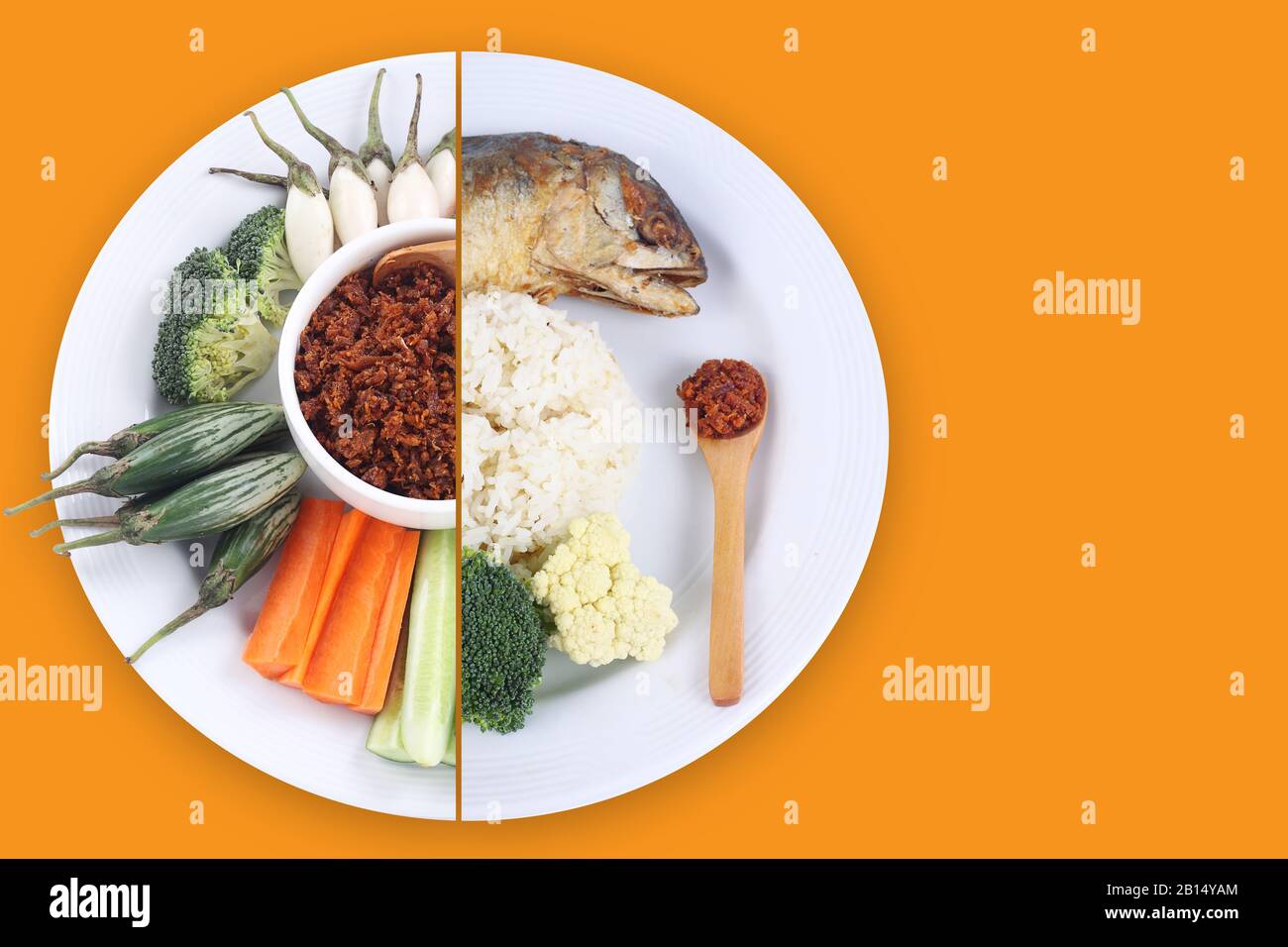 Gesundes Essen isoliert auf orangefarbenem Hintergrund Stockfoto