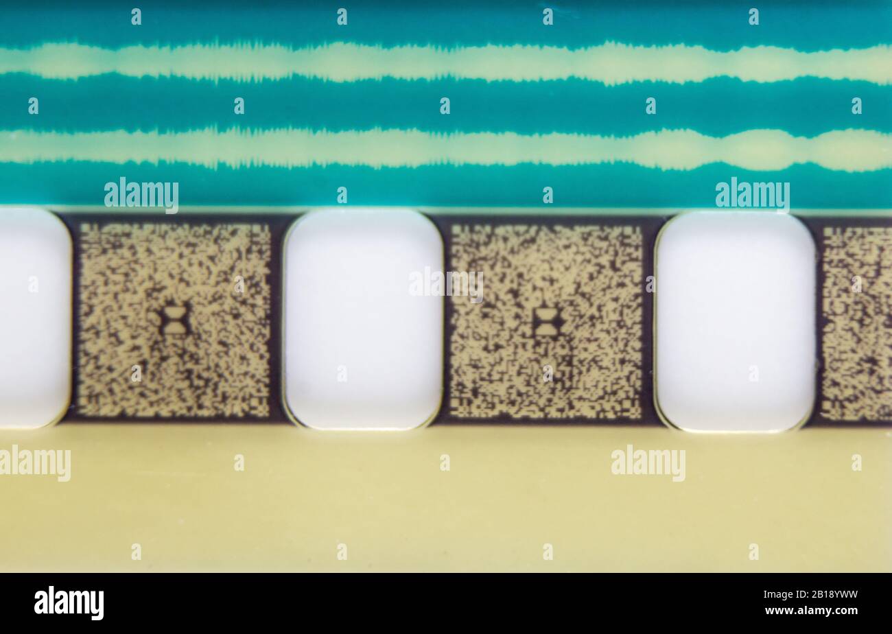 Überreste eines alten Filmstreifens mit Soundtrack Stockfoto