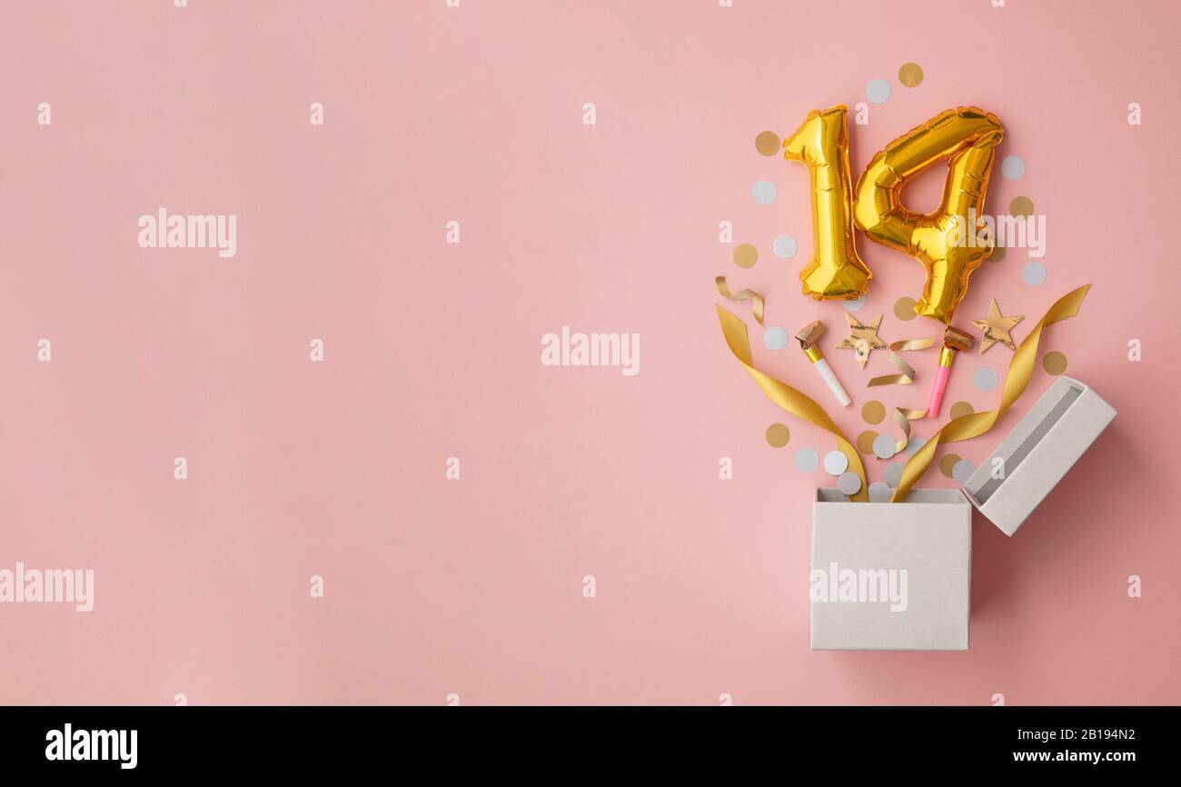 Nummer 14 Geburtstag Ballonfeier Geschenkbox flach explodieren Stockfoto