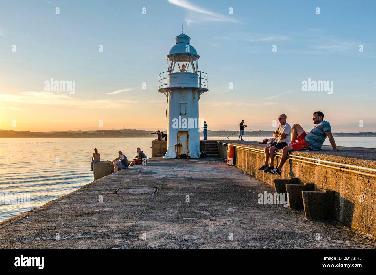 Brixham Pier bei Sonnenuntergang Stockfoto