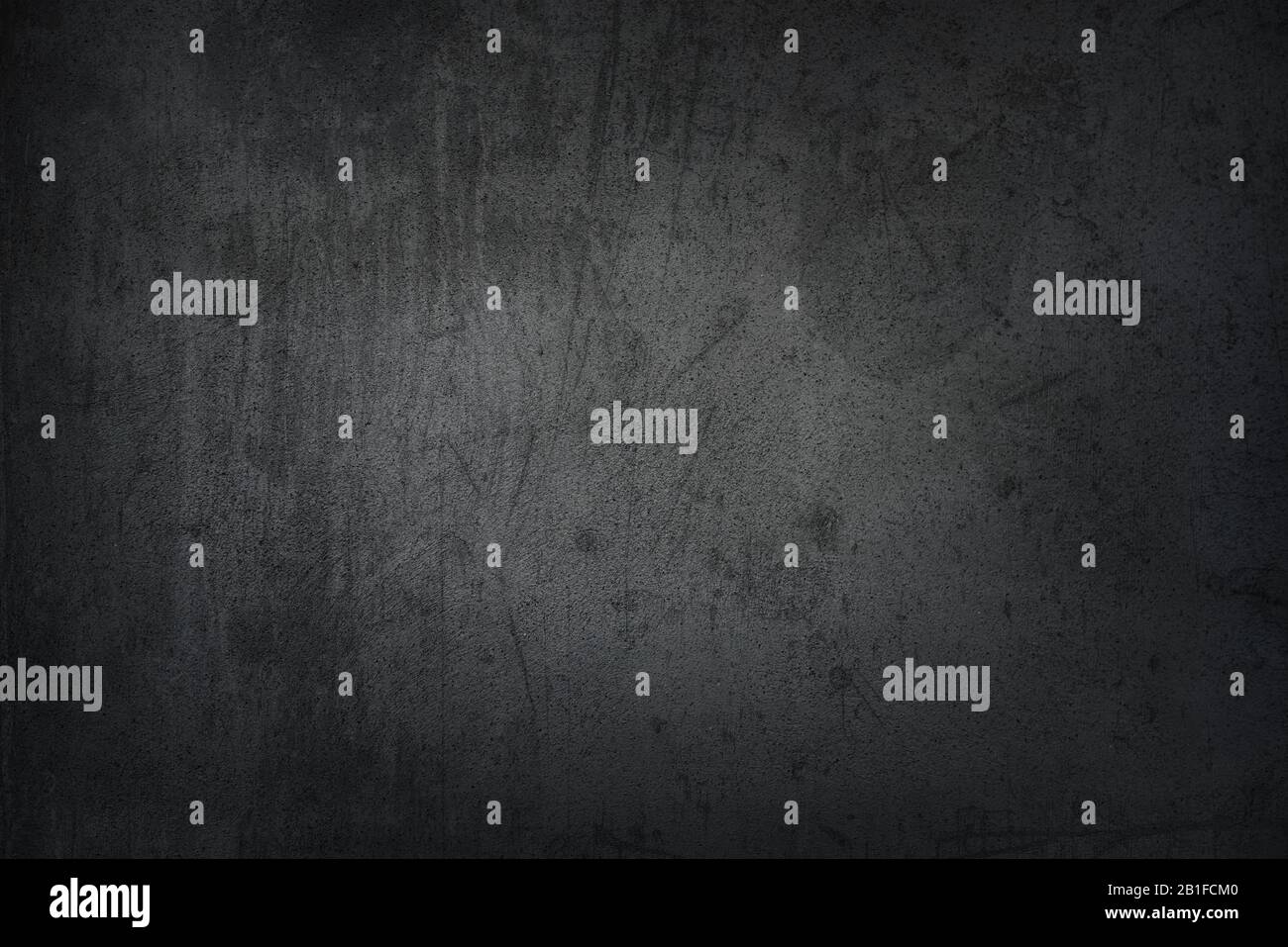 Schwarz grunzelt verblichener Stuck, Beton- und Zementmuster, Strukturierter Hintergrund Stockfoto