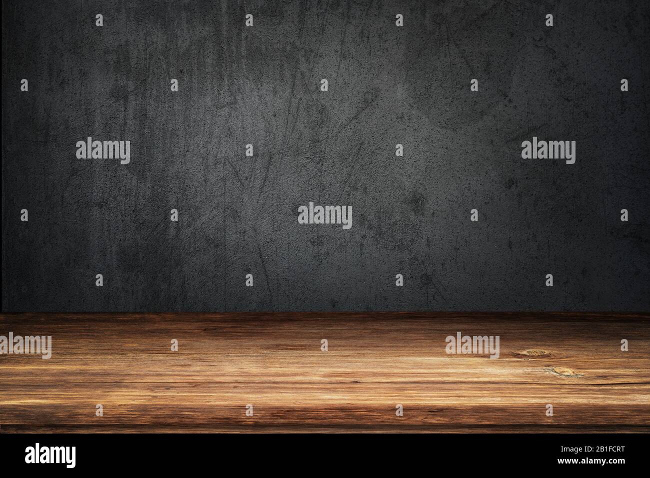 Zementwand aus schwarzem und grauem Beton und Holzfußboden für den Hintergrund Stockfoto