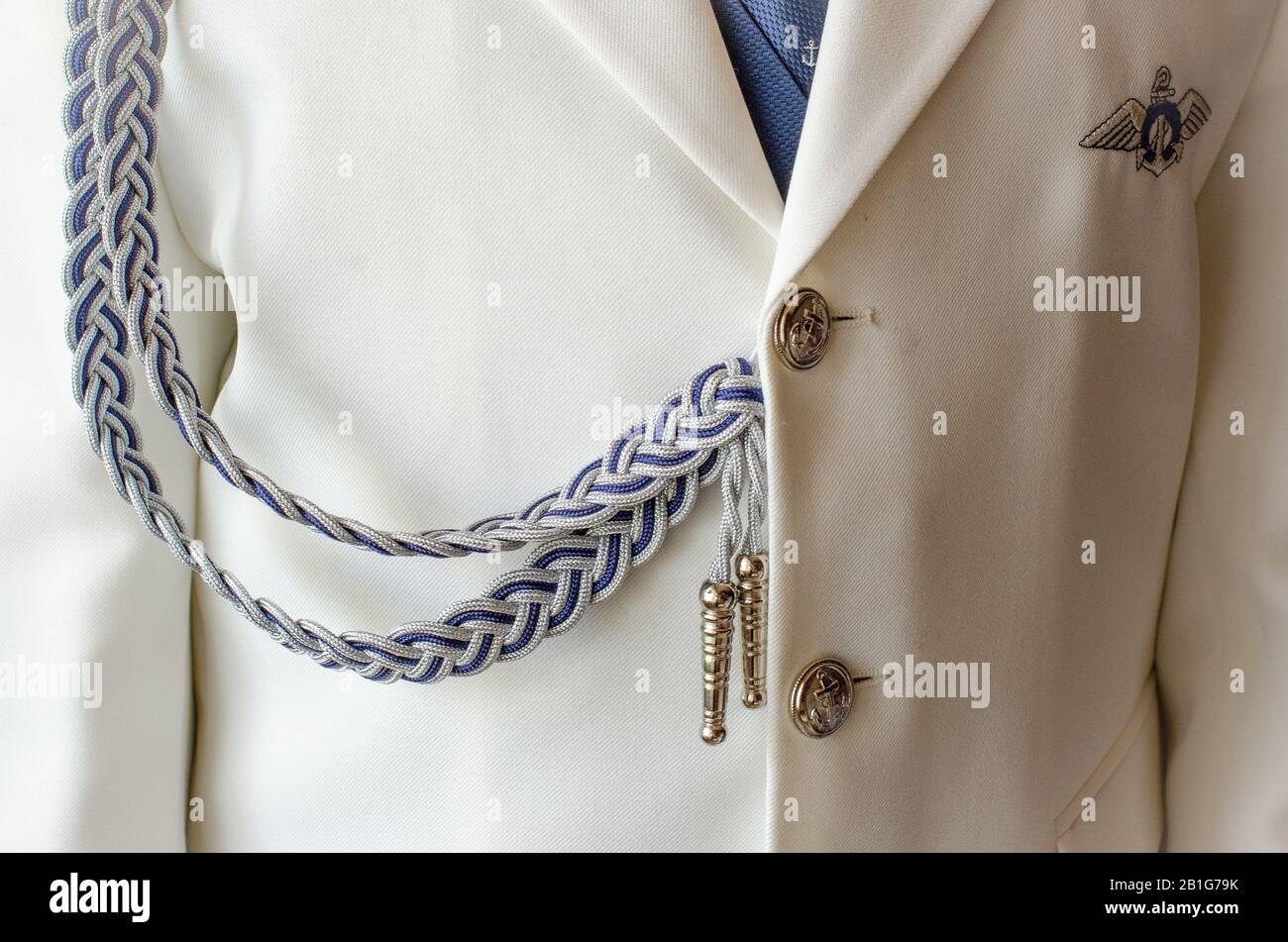 Anzug aus erster Kommunion mit Kordeldetail Stockfoto