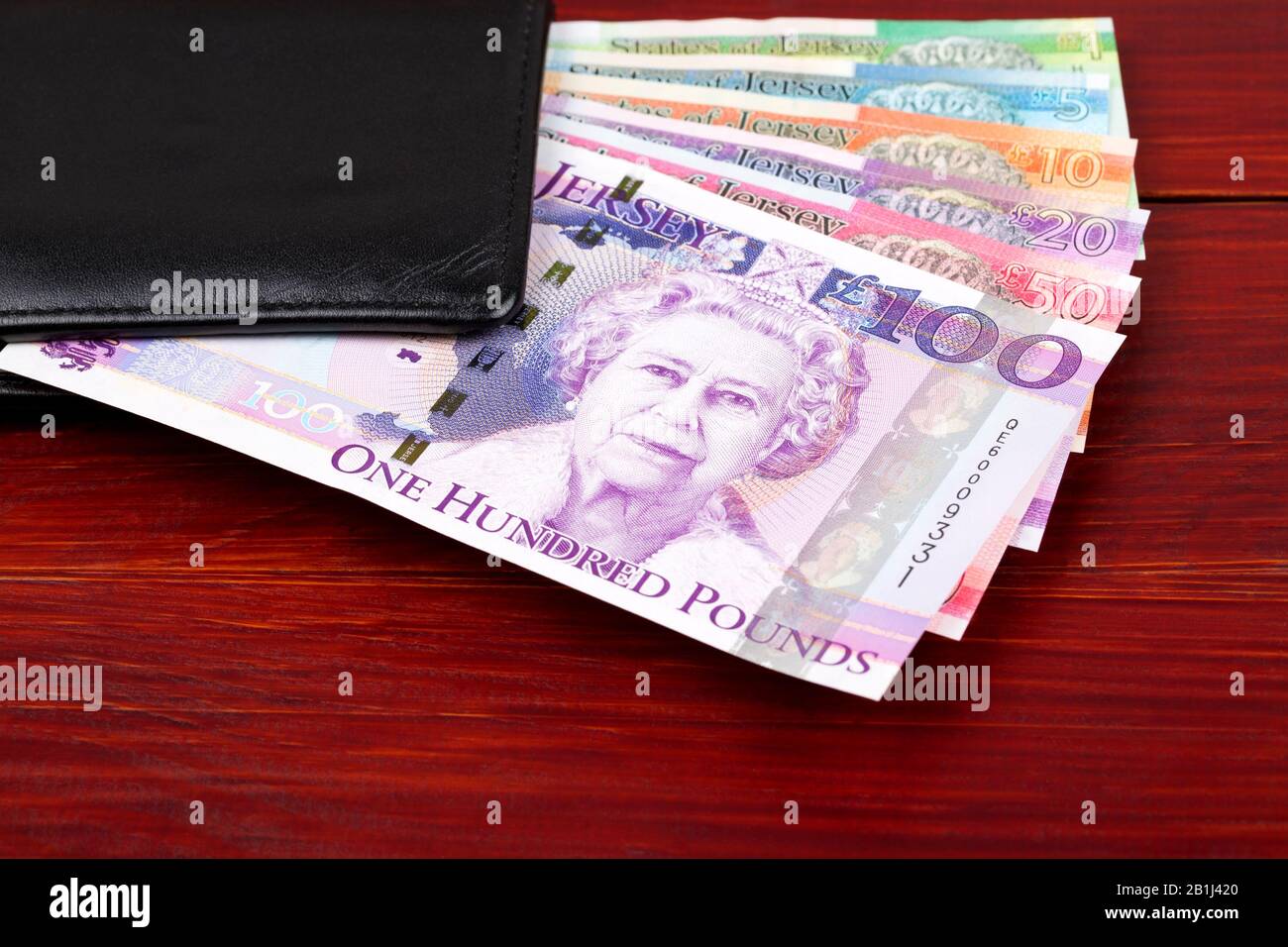 Jersey Pfund in der schwarzen Geldbörse Stockfoto