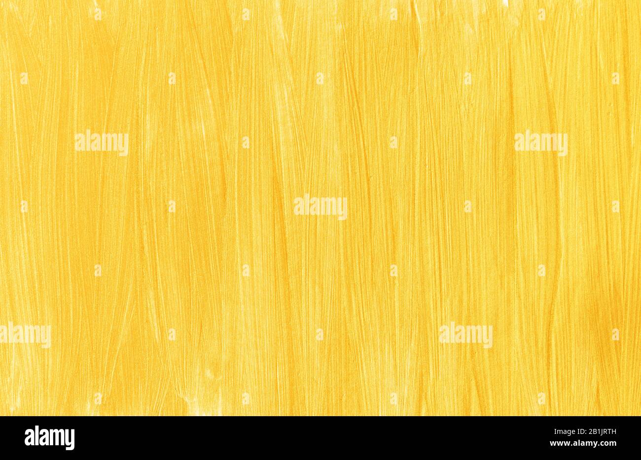 Pinselstriche aus Goldfarbe, vertikale Streifen. Abstrakter moderner trendiger goldener Texturhintergrund Stockfoto