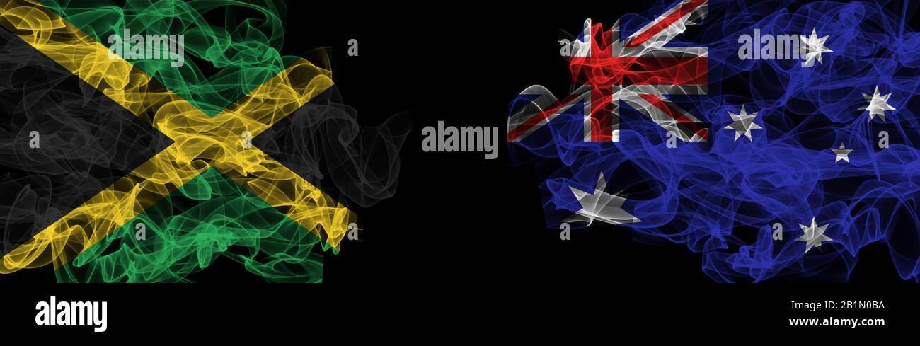 Flags of Jamaica and Australia on Black Background, Jamaica vs Australia Smoke Flags Stockfoto