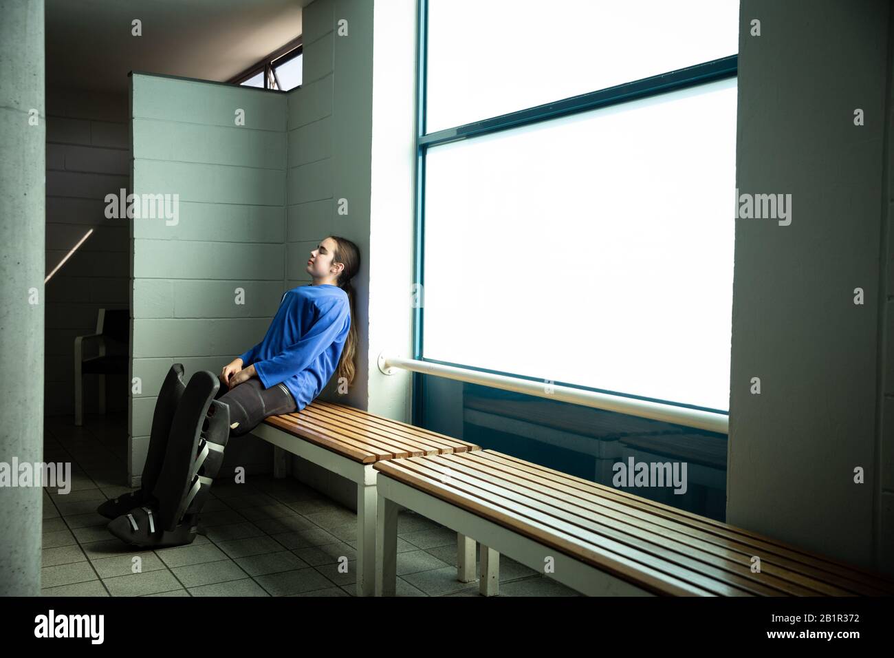 Hockeyweibchen in einer Garderobe Stockfoto
