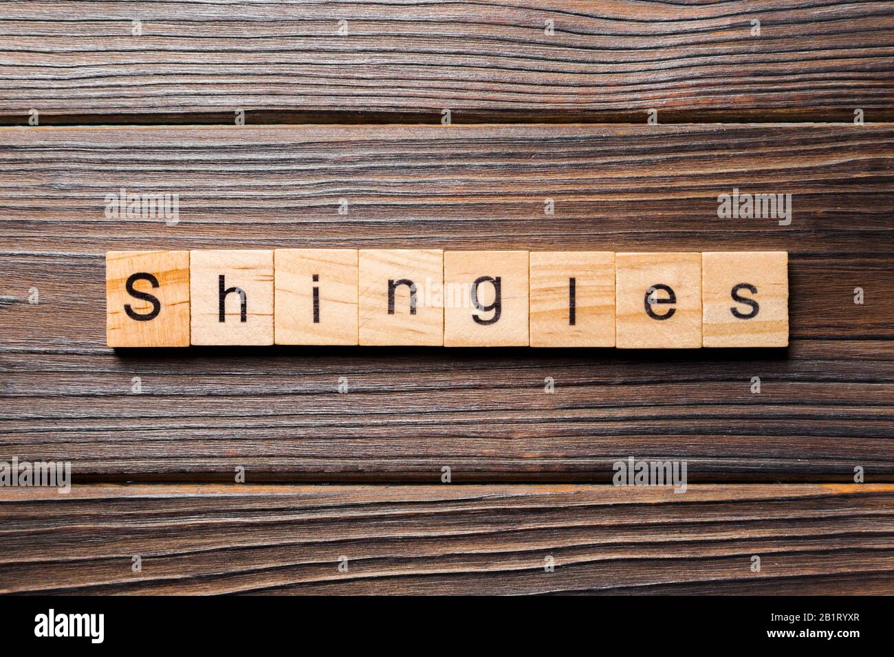 Schindeln Wort auf Holz Block geschrieben. Schindeln text auf Holz- Tabelle für Ihr Design, Konzept. Stockfoto