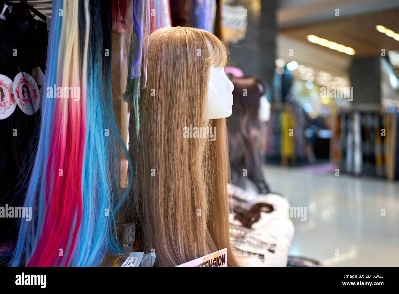 Haarverlängerungen zum Verkauf, Perücken, Frau, Stockfoto