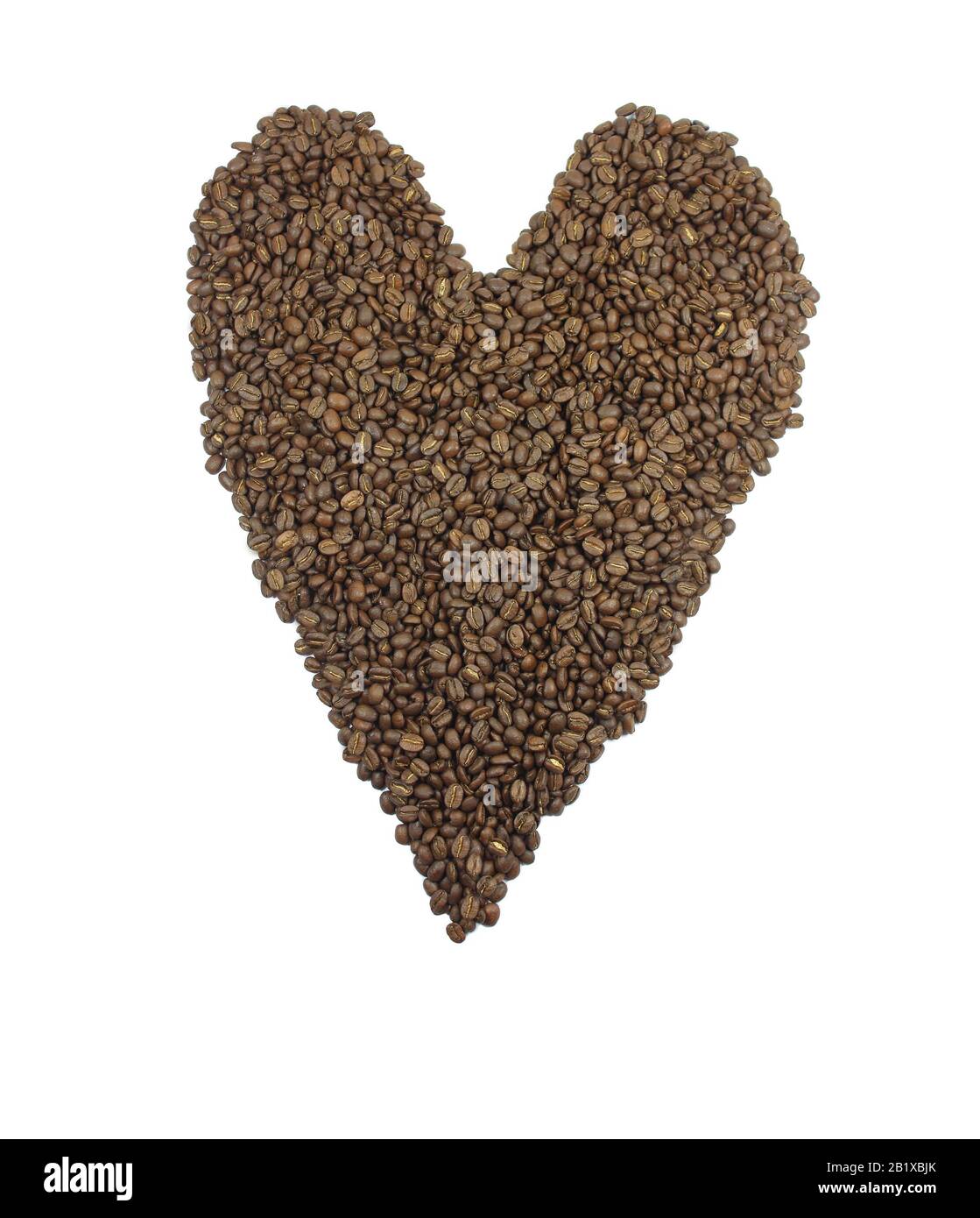 Herzblut aus dunkel gerösteten Kaffeebohnen Stockfoto