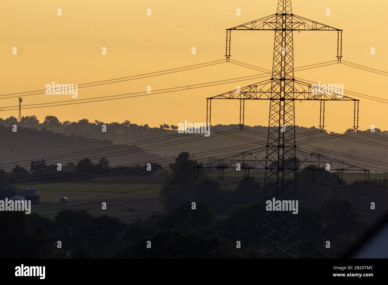 Stromgast im Sonnenuntergang bei Gießen, Hessen, Deutschland Stockfoto