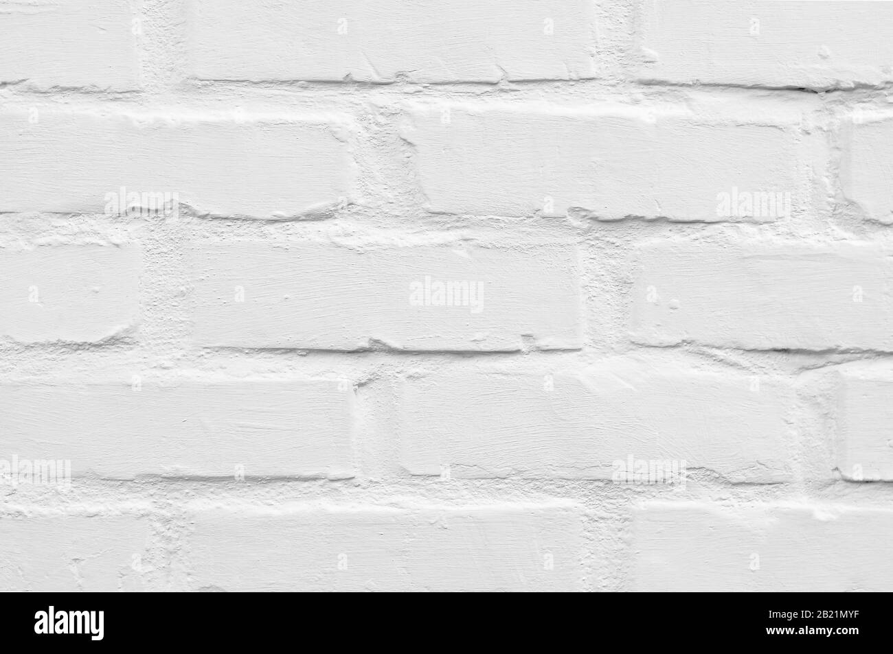 Hintergrund mit weißer Ziegelstruktur. Abstrakte, verwitterte Textur. Die moderne Wand. Stockfoto