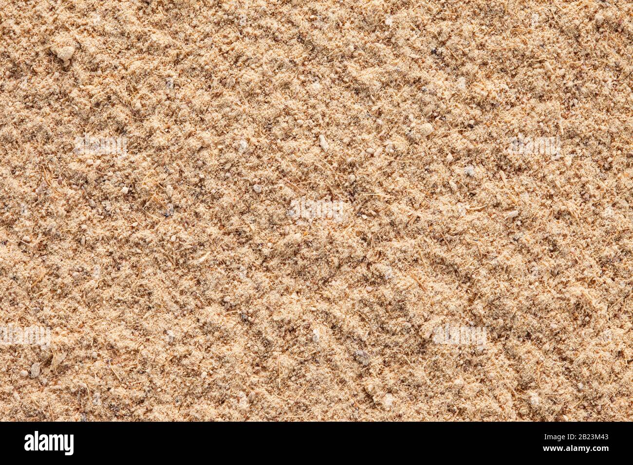 Ground Ginger (Zingiber officinale) Textur, Hintergrund im Vollformat. Wird weltweit als Delikatesse, Medizin oder Gewürz verwendet. Stockfoto