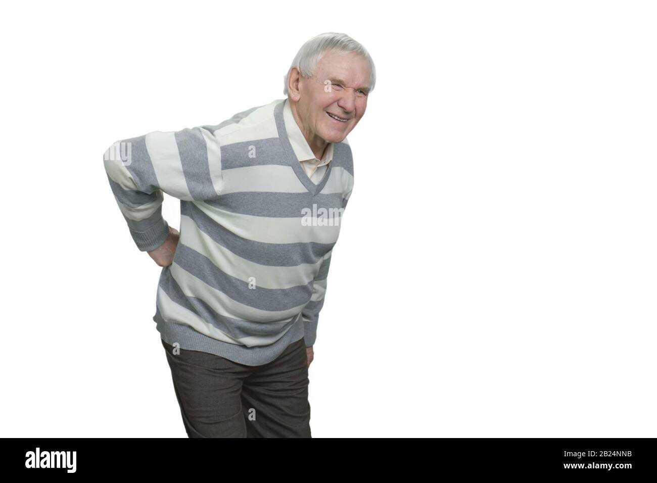 Alter Mann mit Rückenschmerzen. Stockfoto