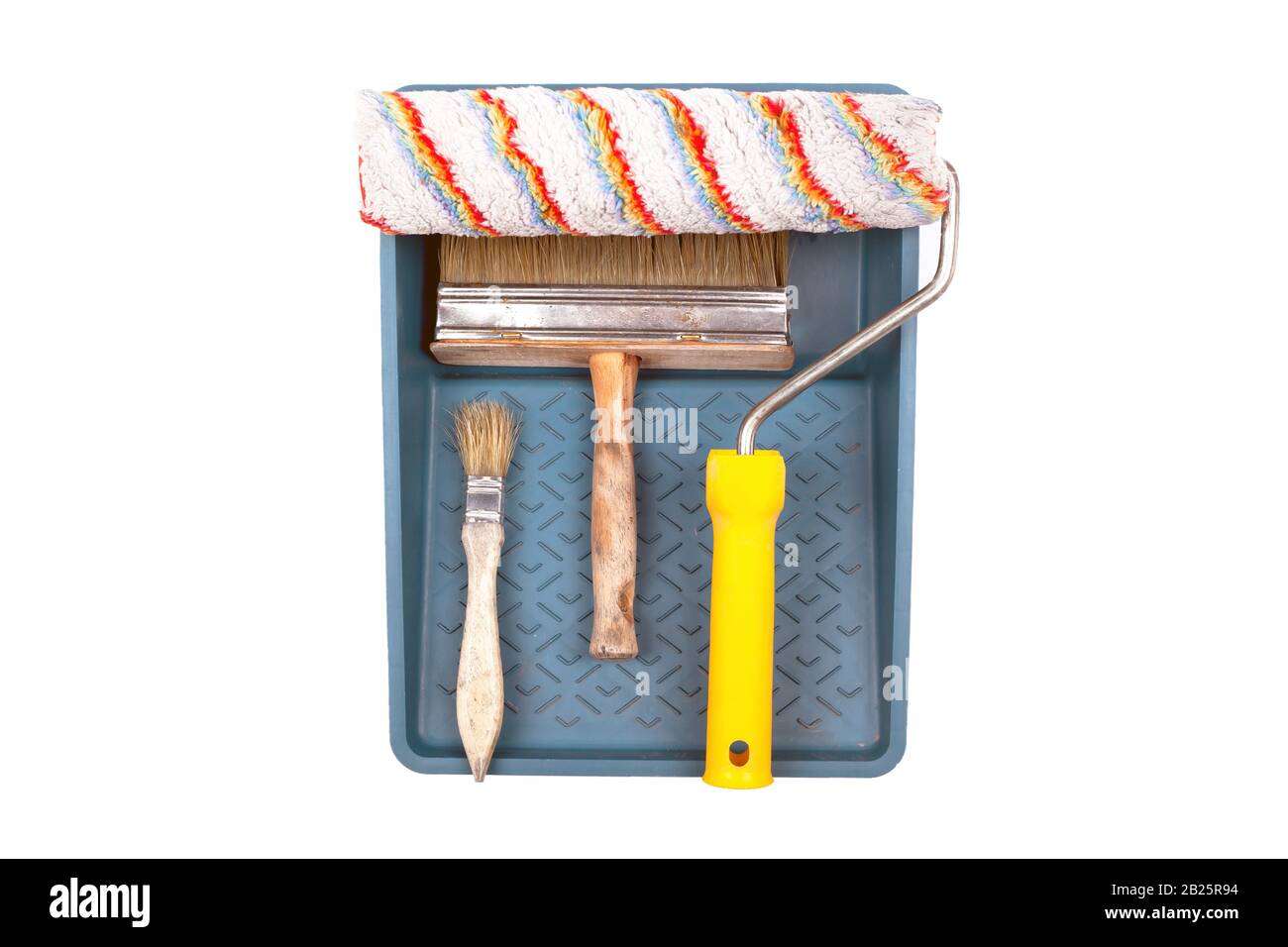 Werkzeugsatz zum Lackieren von Wand, Rolle, Fach, Bürste. Isoliert auf weißem Hintergrund. Stockfoto