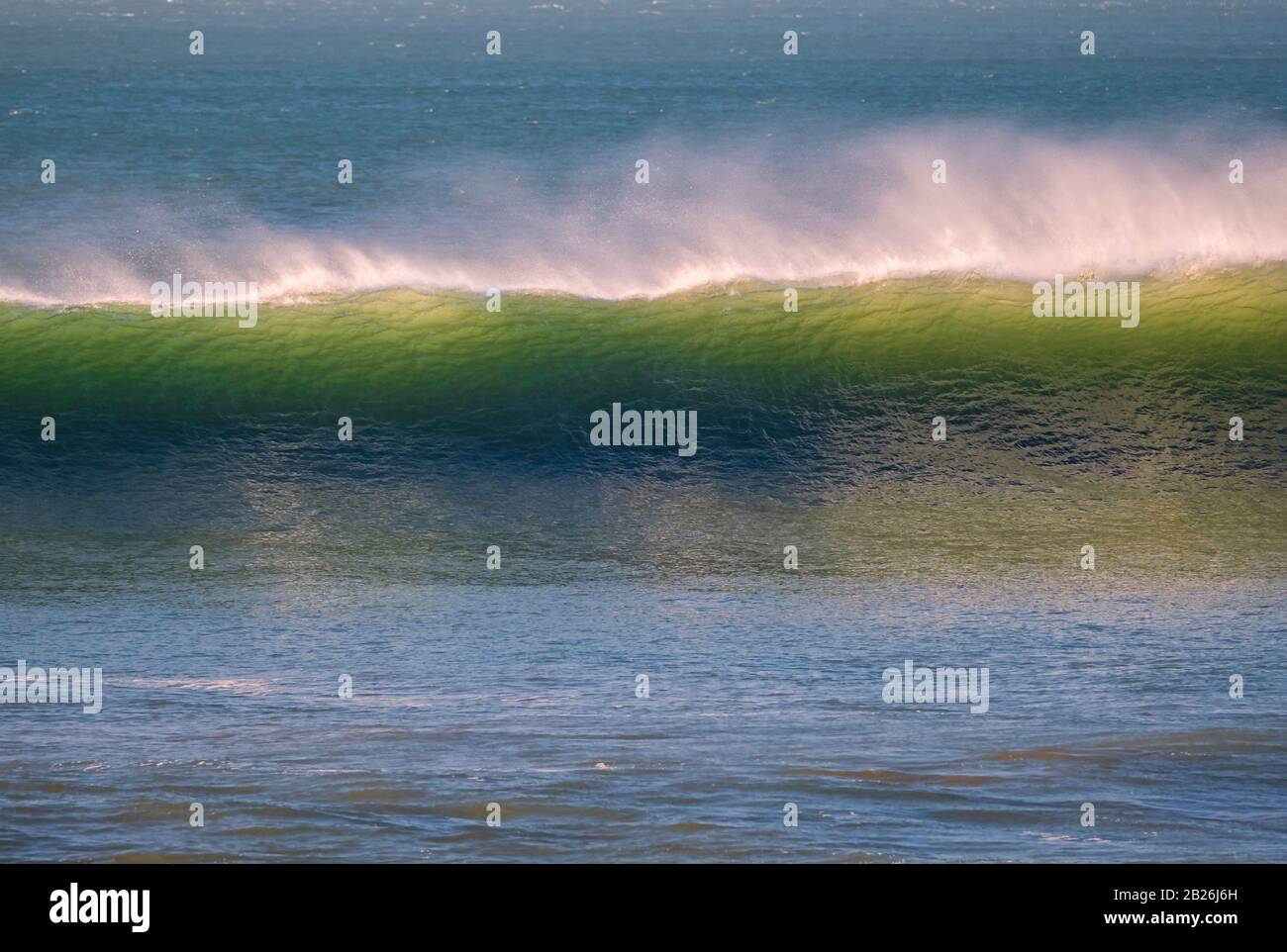 Wunderbare Wellen Surfen in diesem Urlaub und Surfziel Woolacombe Bay, Strand, Urlaubsziel, North Devon, Süd-West Stockfoto