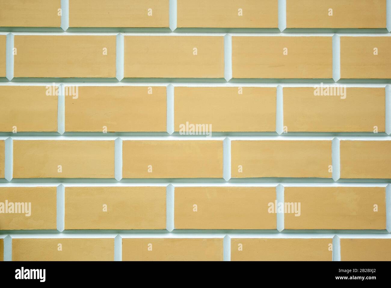 Beige Ziegel wand Textur. Neue, saubere beige Steine Hintergrund Stockfoto