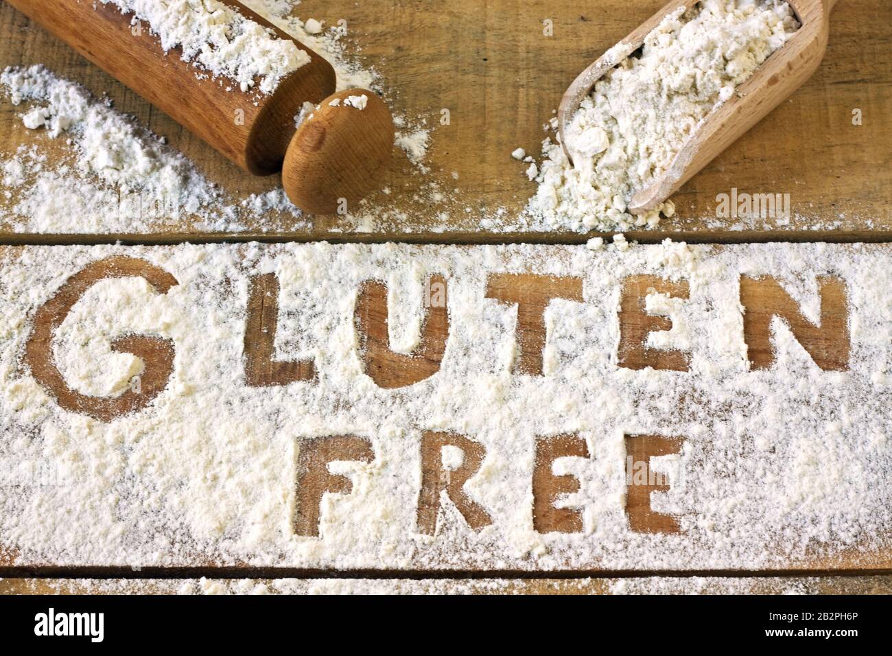 Glutenfreie Wort mit Holz Hintergrund Stockfoto