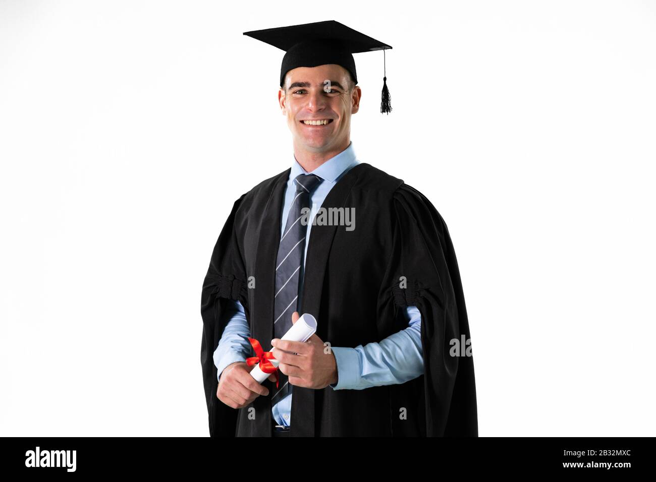 Kaukasischer Student mit Abschluss eines Zertifikats Stockfoto