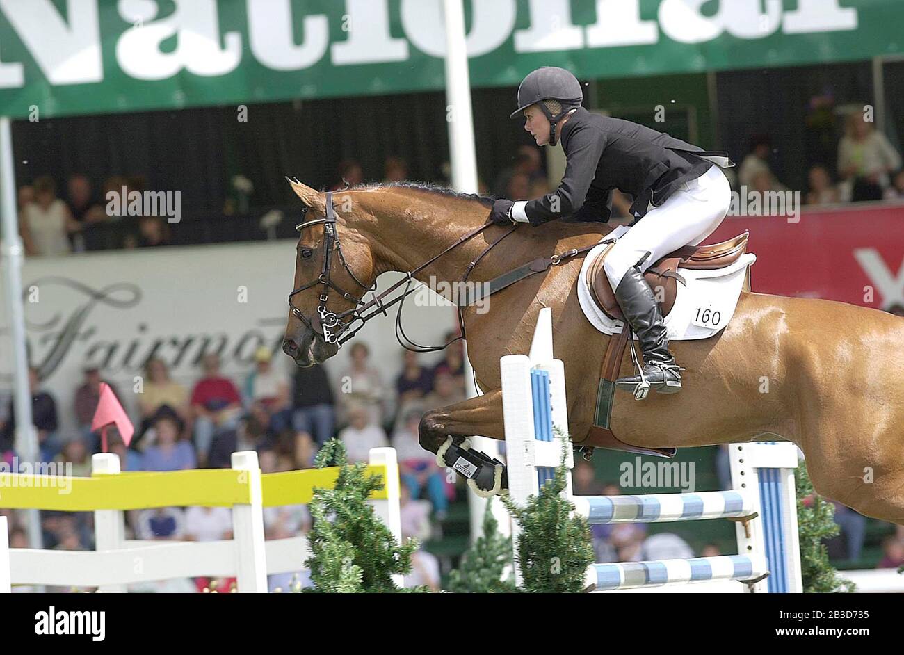 The National, Spruce Meadows, Juni 2001, Joie Gatlin (USA), die den Divine Akita Drilling Cup von Edesa reitet Stockfoto