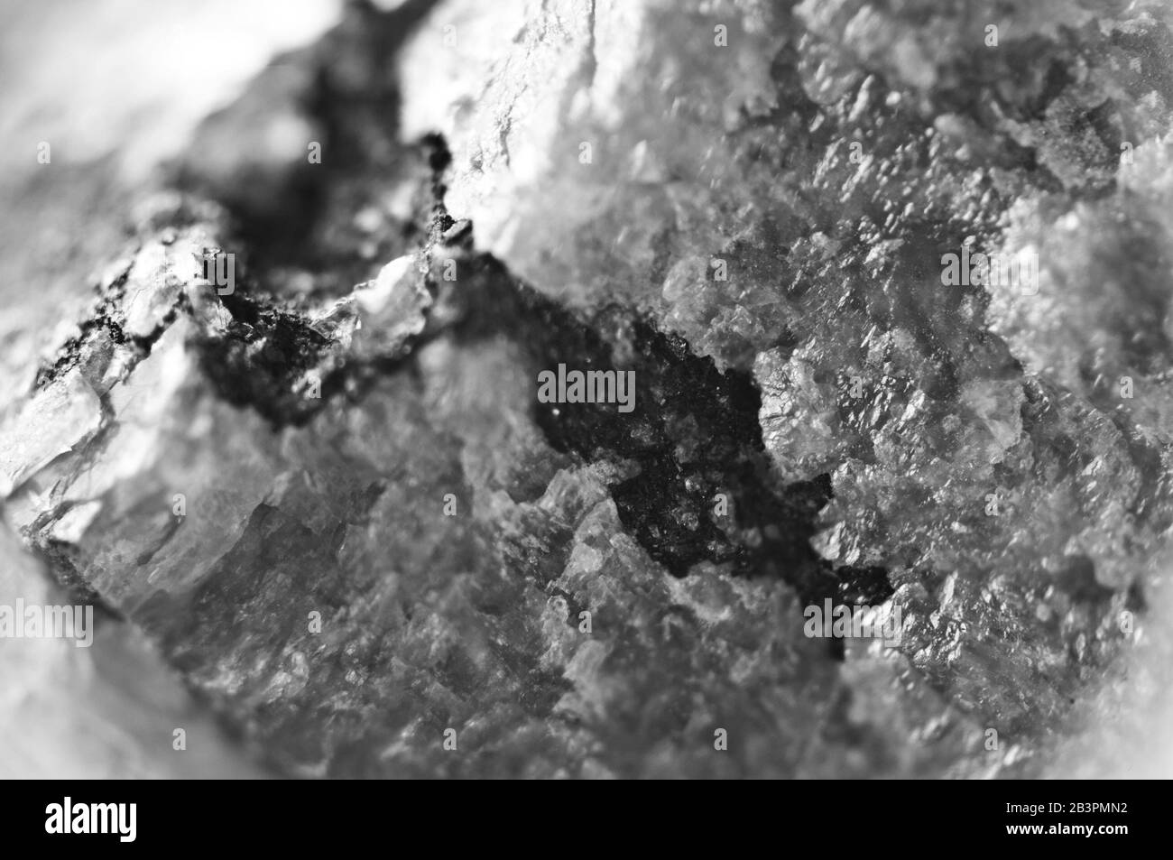 Nugget. Makro. Wunderschöner, abstrakter Hintergrund. Schwarz-weiß Stockfoto