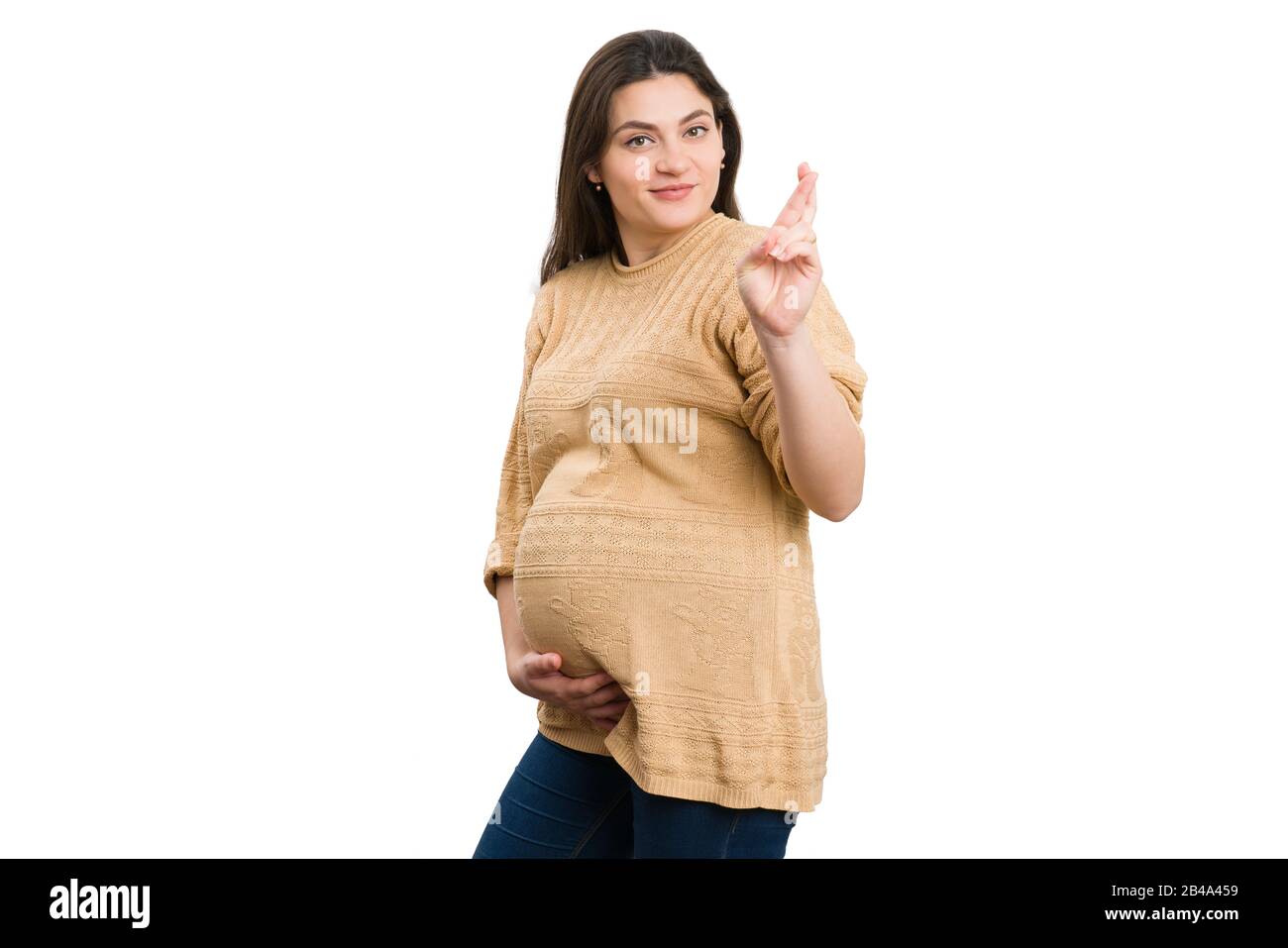 Hoffnungsvolle zukünftige Mutter, die viel Glück hat Stockfoto