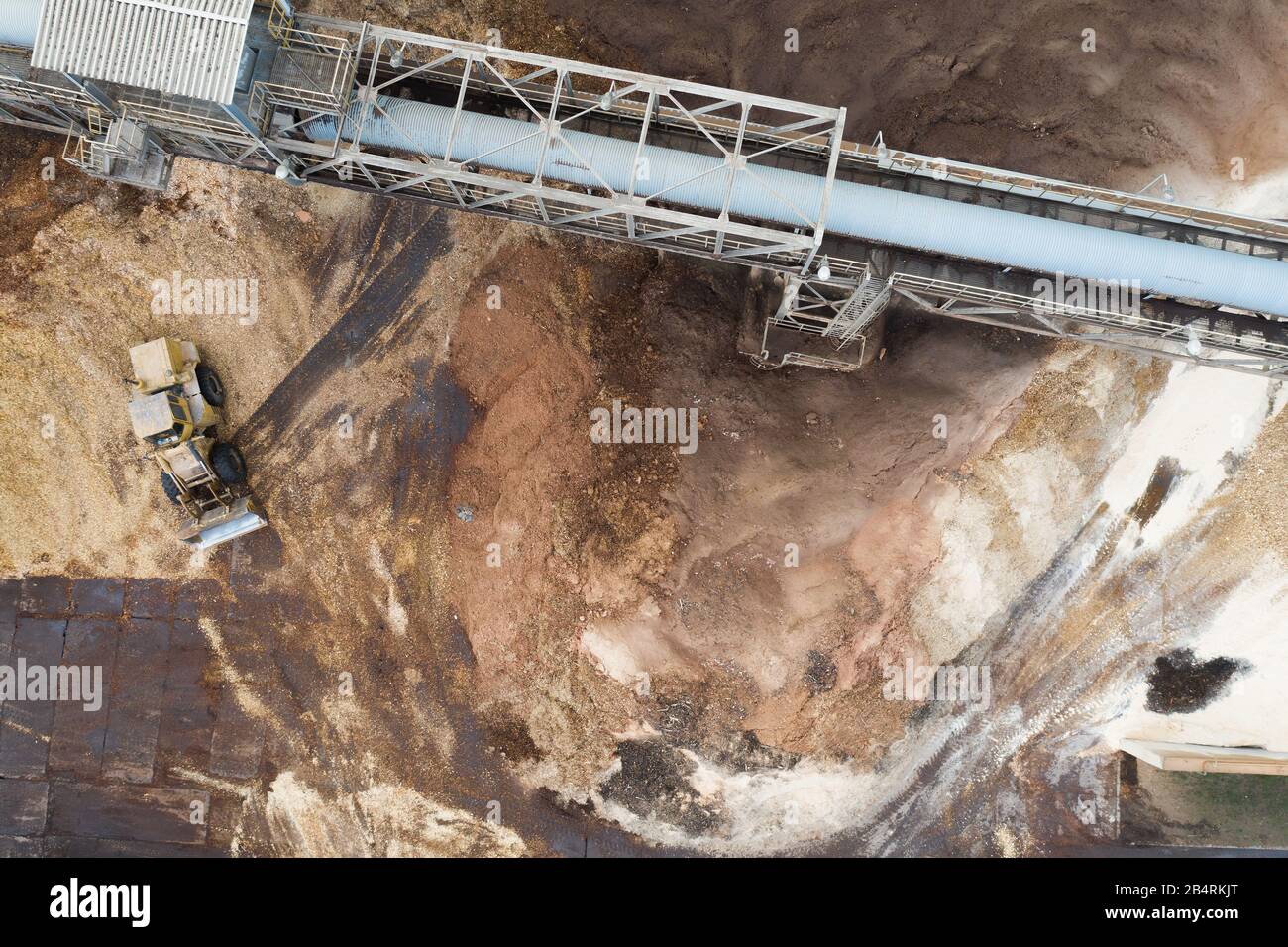 Bagger in einer Holzfabrik Draufsicht Stockfoto