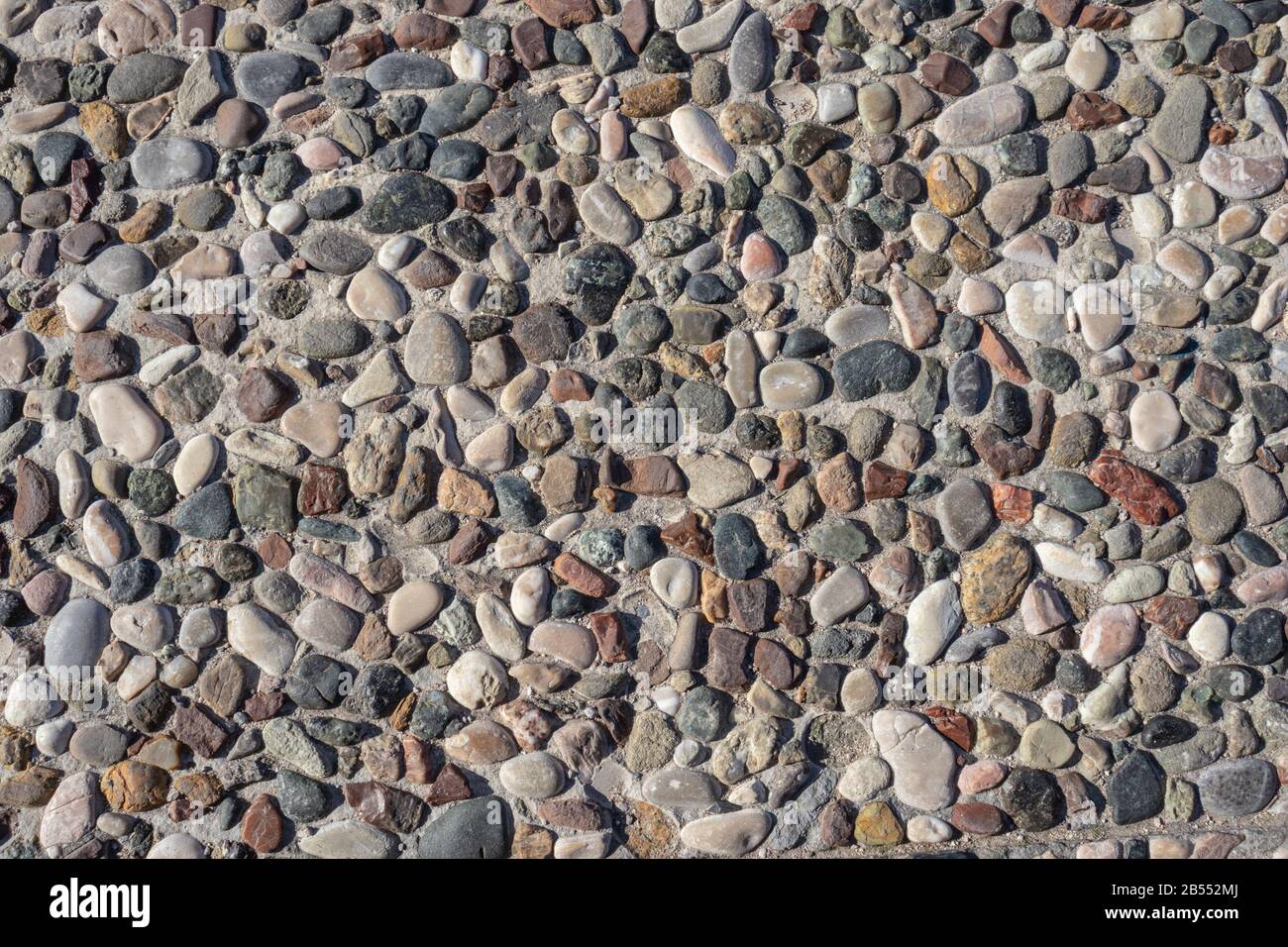 Pflaster Kieselpfad Muster Textur Hintergrund, alter Stil Stein Gehweg Stockfoto