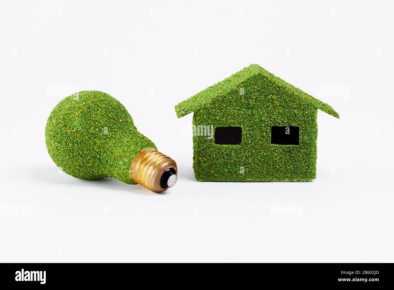 Umweltfreundliches Zuhause und energieeffiziente Glühbirne Stockfoto