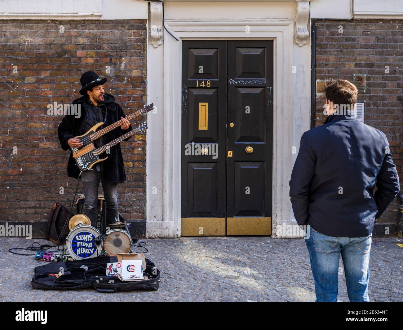 Brick Lane Gaukler - London Street Musiker und One Man Band Hendrix Tribute Lewis Floyd Henry Stockfoto