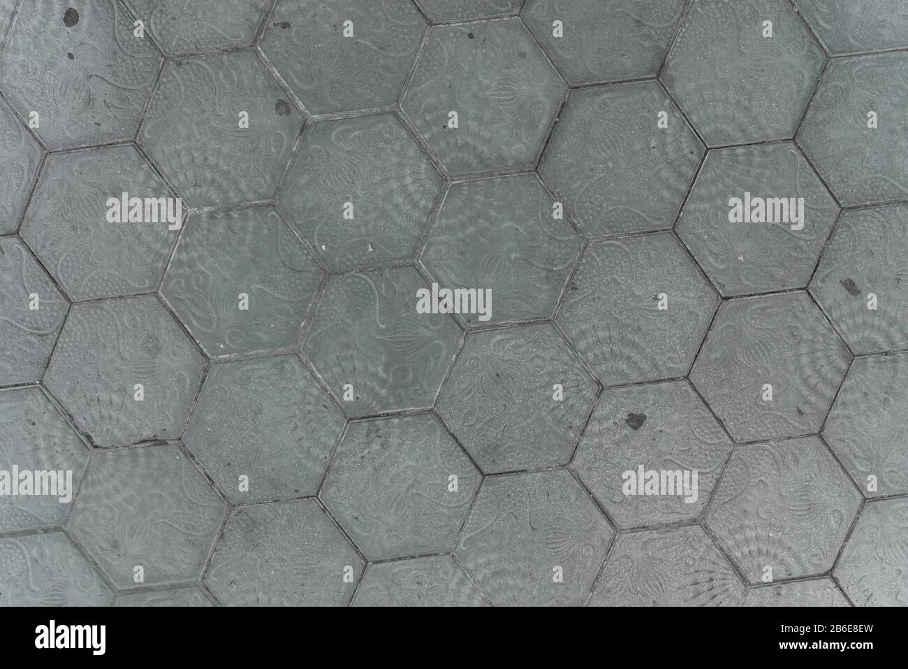 Muster, Textur und abstrakter Hintergrund einer Gehwegpflastersteine. Stockfoto