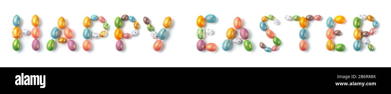 Oster-Banner. Mehrfarbige Eier legten die Form des Wortes Happy Easter dar. Stockfoto