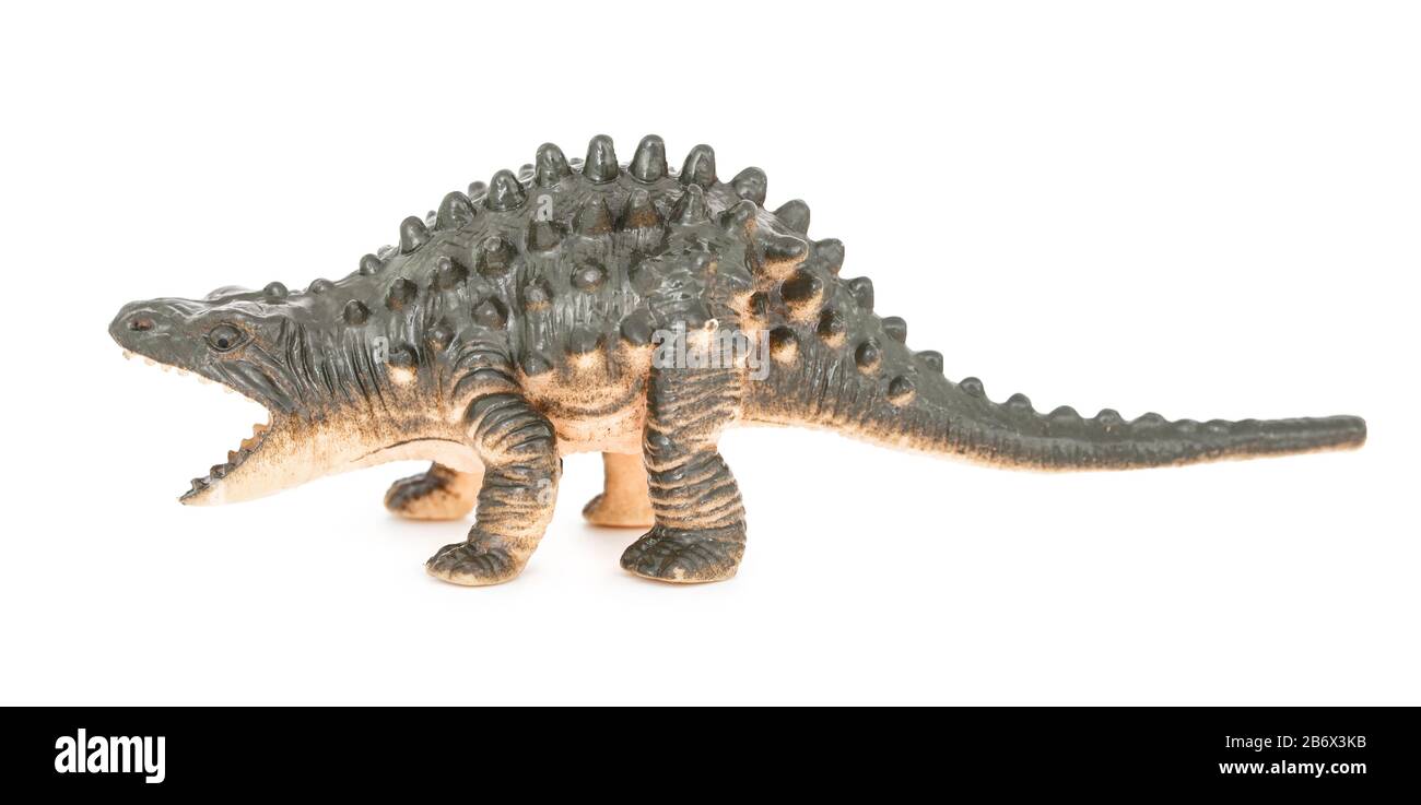 Ankylosaurus Plastikspielzeug. Isoliert auf weißem Hintergrund mit natürlichem Schatten. Gepanzerter Dinosaurier auf weißem bg. Dinosaurier mit Stacheln. Stockfoto