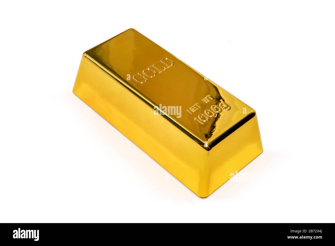Foto eines 1kg Goldbarren isoliert auf weißem Hintergrund Stockfoto