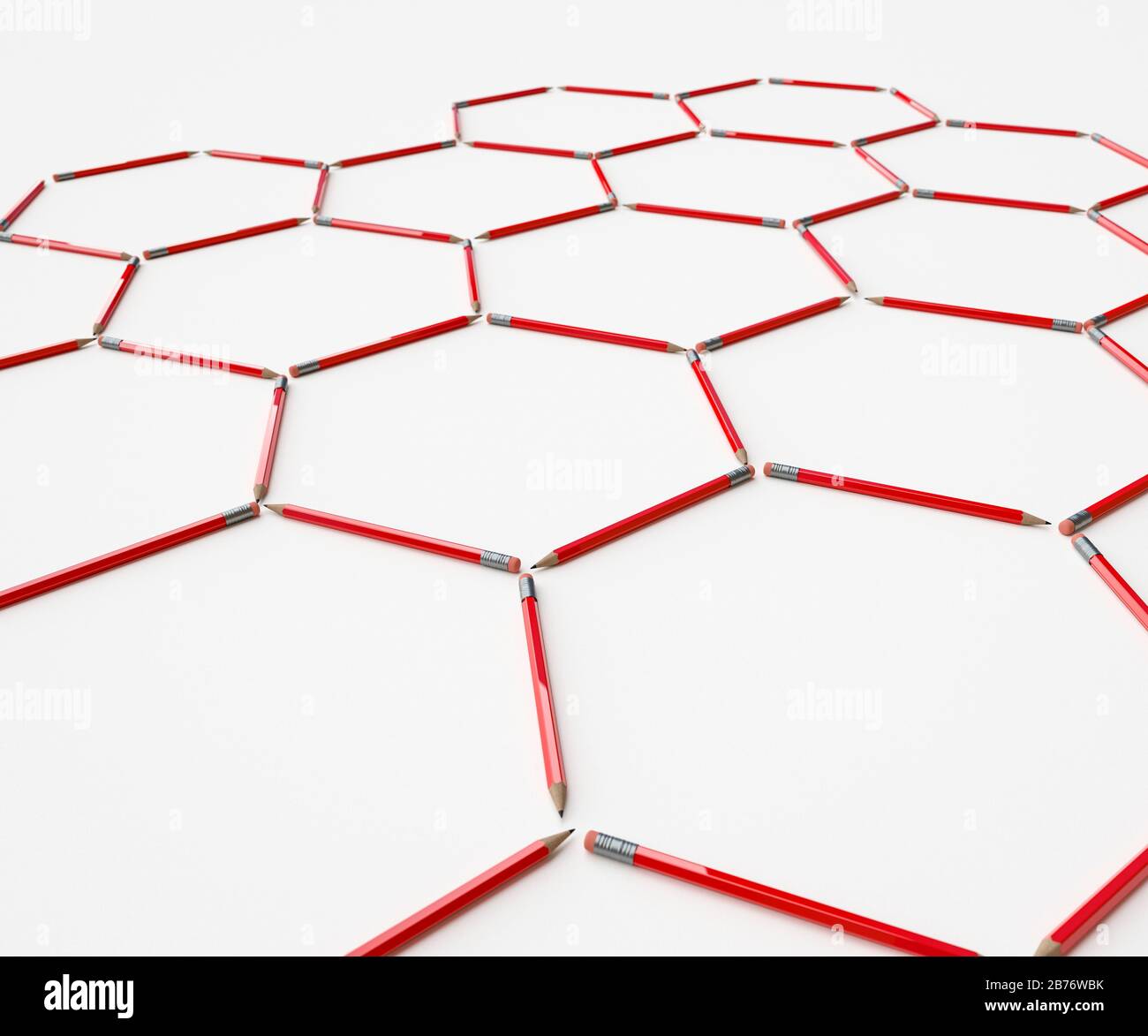 Graphitstifte, die die hexagonale Bildung eines Gitters von Graphen-Atomen darstellen Stockfoto