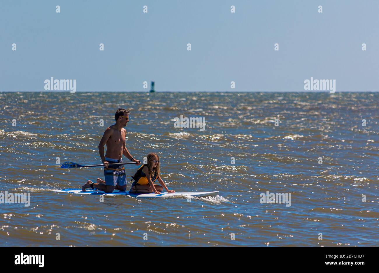 Paar auf Paddle Board Stockfoto