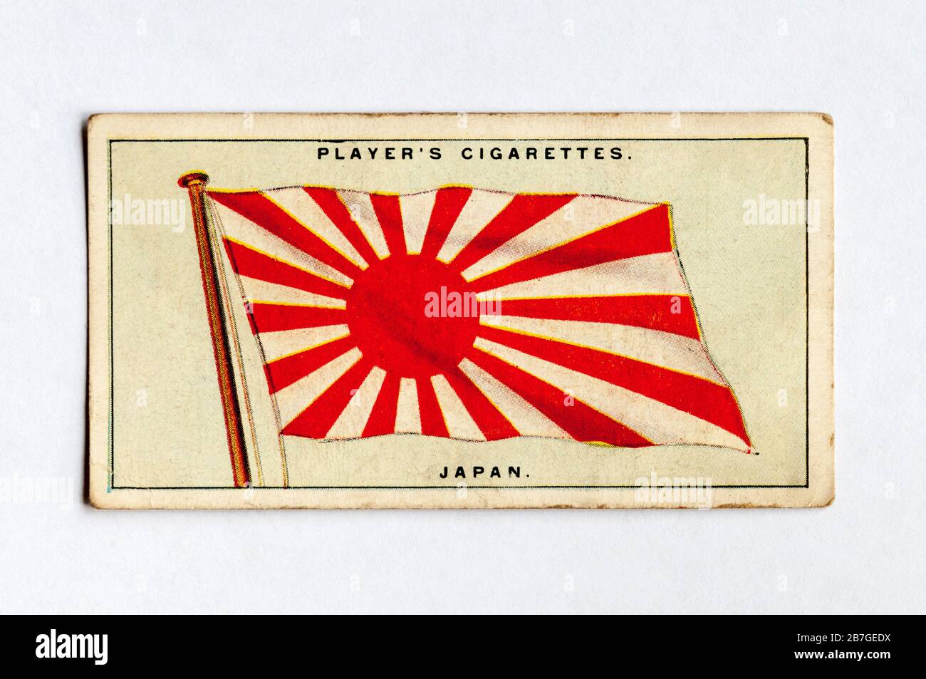 Die Zigarettenkarte des Spielers in Flags der Serie League of Nations zeigt die Flagge Japans. Ausgabe Von 1928. Stockfoto