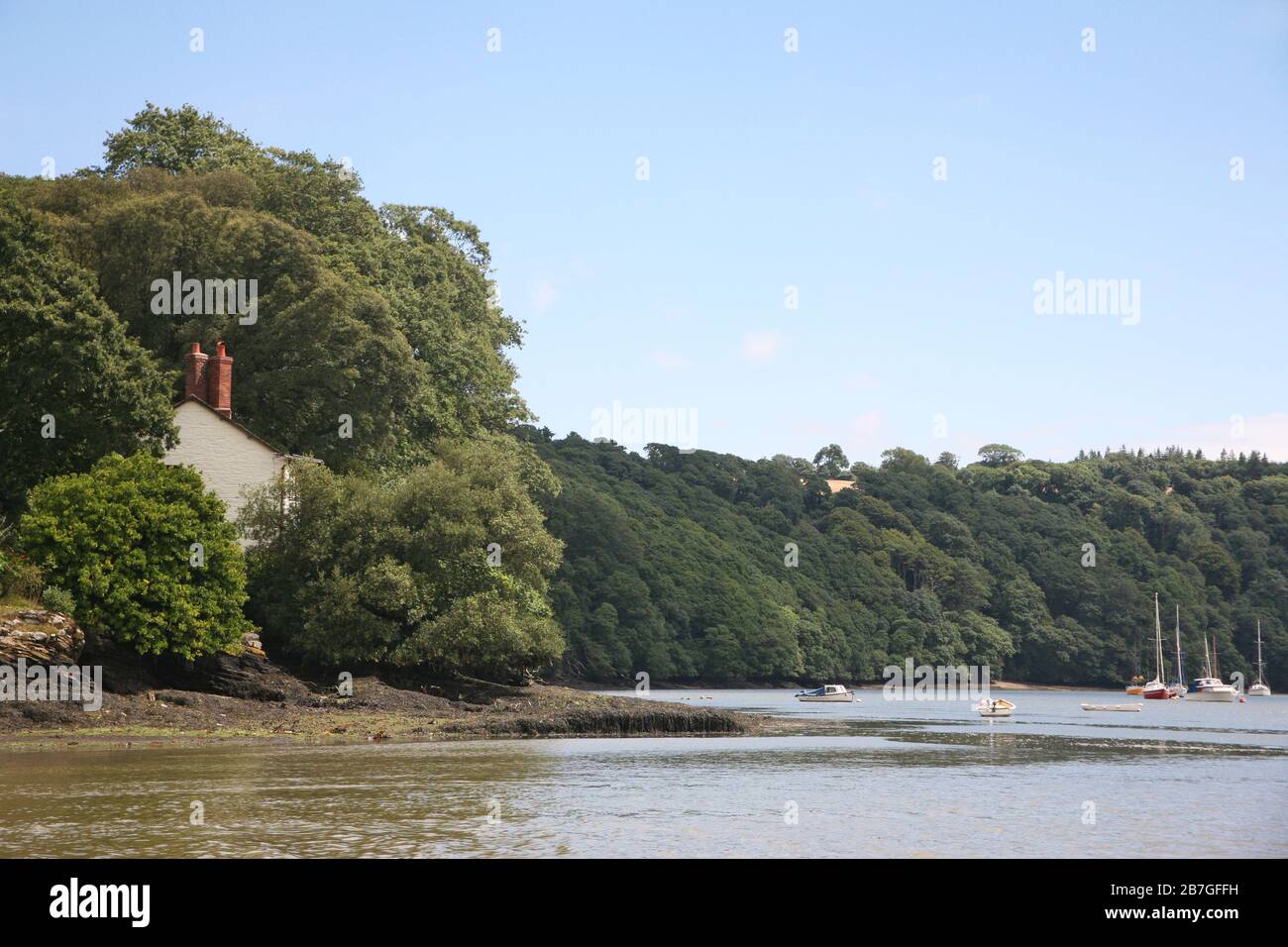 Ferry House, ein Haus am Ufer des Truro River gegenüber von Malpas, Cornwall, England, Großbritannien Stockfoto