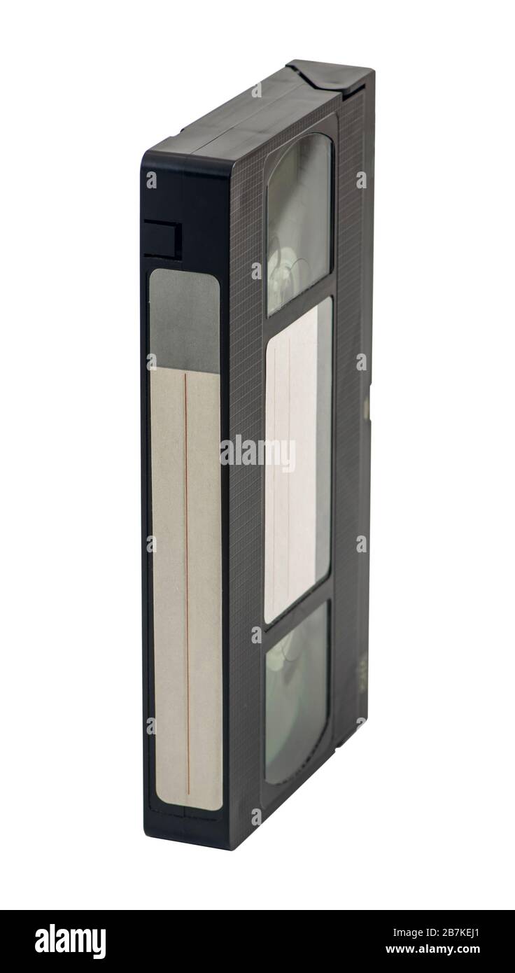 VHS-Videokassette mit leerem Aufkleber, isoliert auf weißem Hintergrund. Alte beliebte Videotechnologie aus den 1980er und 1990er Jahren. Stockfoto