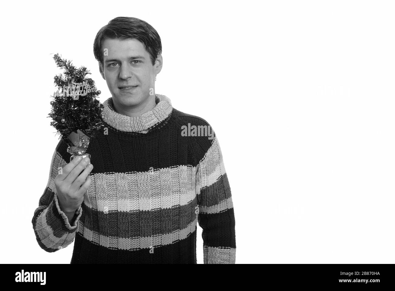 Happy stattlichen kaukasischen Mann, Frohes Neues Jahr Baum Stockfoto
